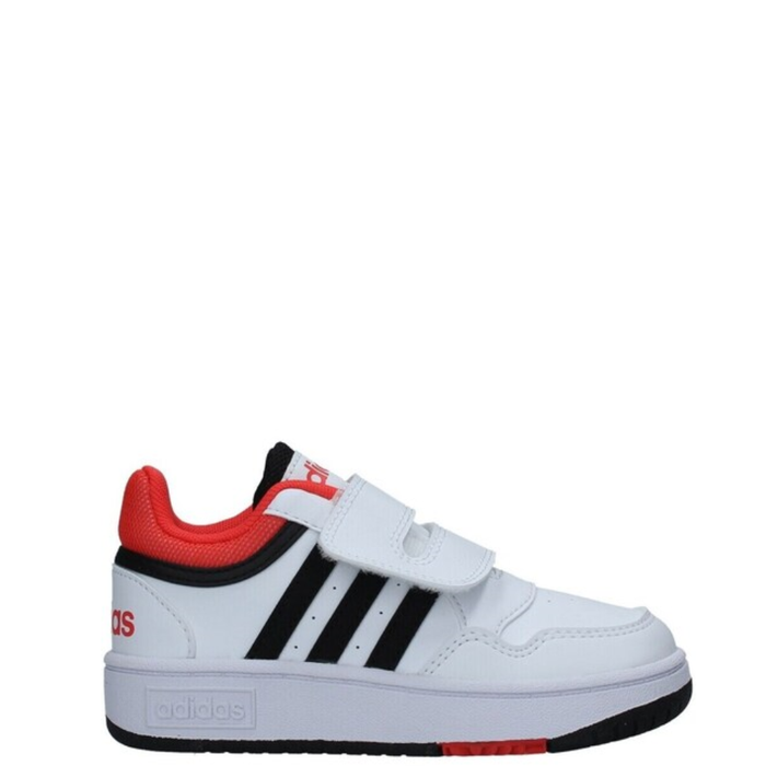 A pair of infants' adidas sneakers with a white synthetic leather upper, black and red accents, and a hook-and-loop closure.