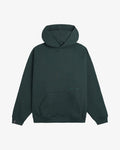 A front view of the Tonal Oversized Hoodie in pine, laid flat on a white background. The image highlights the kangaroo front pocket, the tone on tone embroidered c'est normal logo on the chest, and the black cuff tag on the right sleeve.