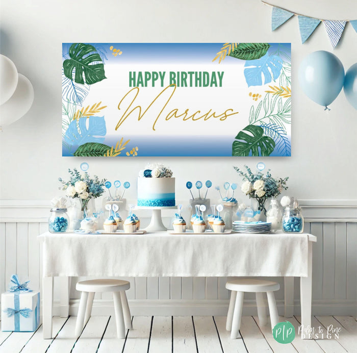 a table with a cake and balloons on it