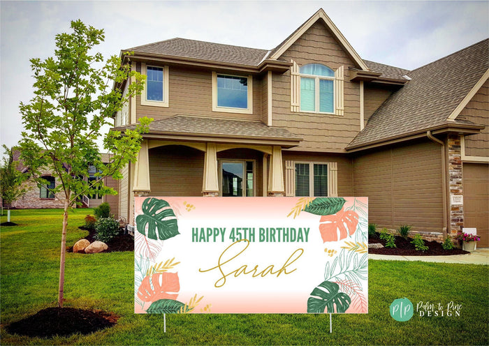 Hawaiian birthday welcome banner in yard