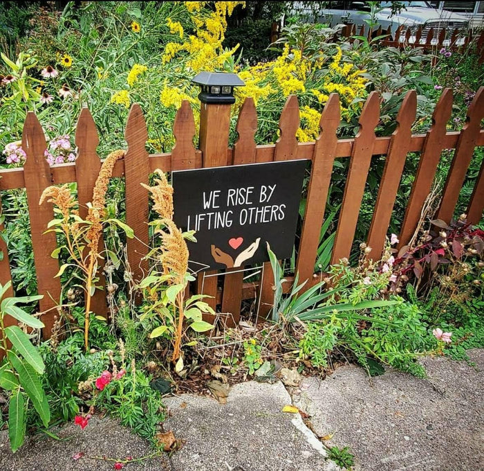 We Rise By Lifting Others Yard Sign