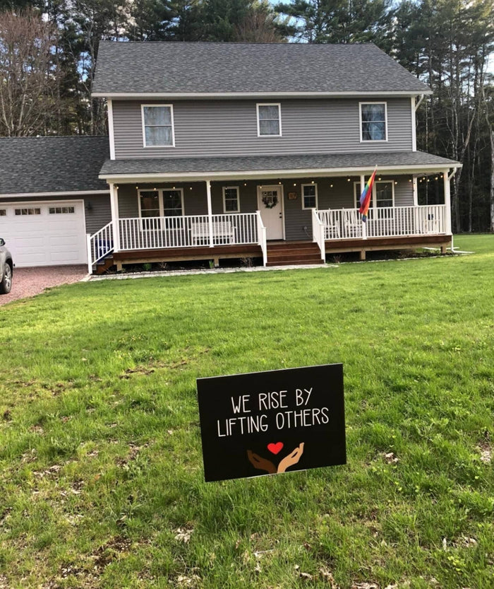 We Rise By Lifting Others Yard Sign