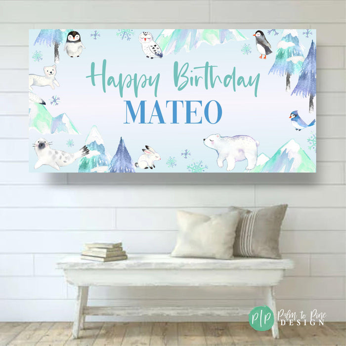 polar birthday banner hung on wall