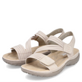 Pair of beige sandals on a white background