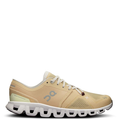 A pair of women's running shoes in beige color with white and gray accents, designed for lightweight and breathability.