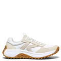 A low-top sneaker in white and beige suede and mesh, featuring a chunky white midsole with a brown textured, bubbly outsole, shown from a side profile on a white background.