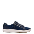 Navy blue sneaker with a white sole on a light gray background